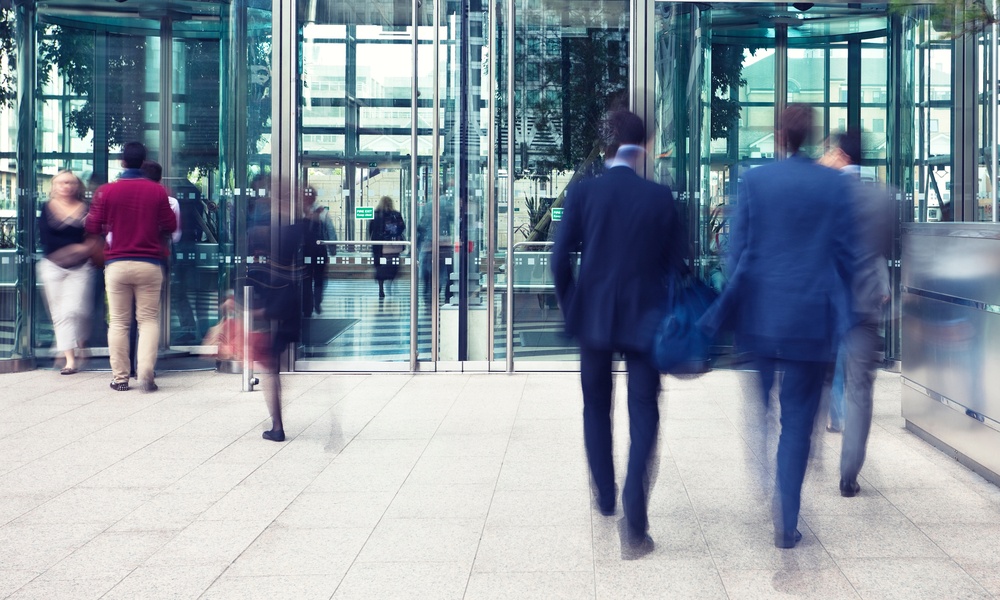 Business People Entering And Leaving Office Building, Motion Blur