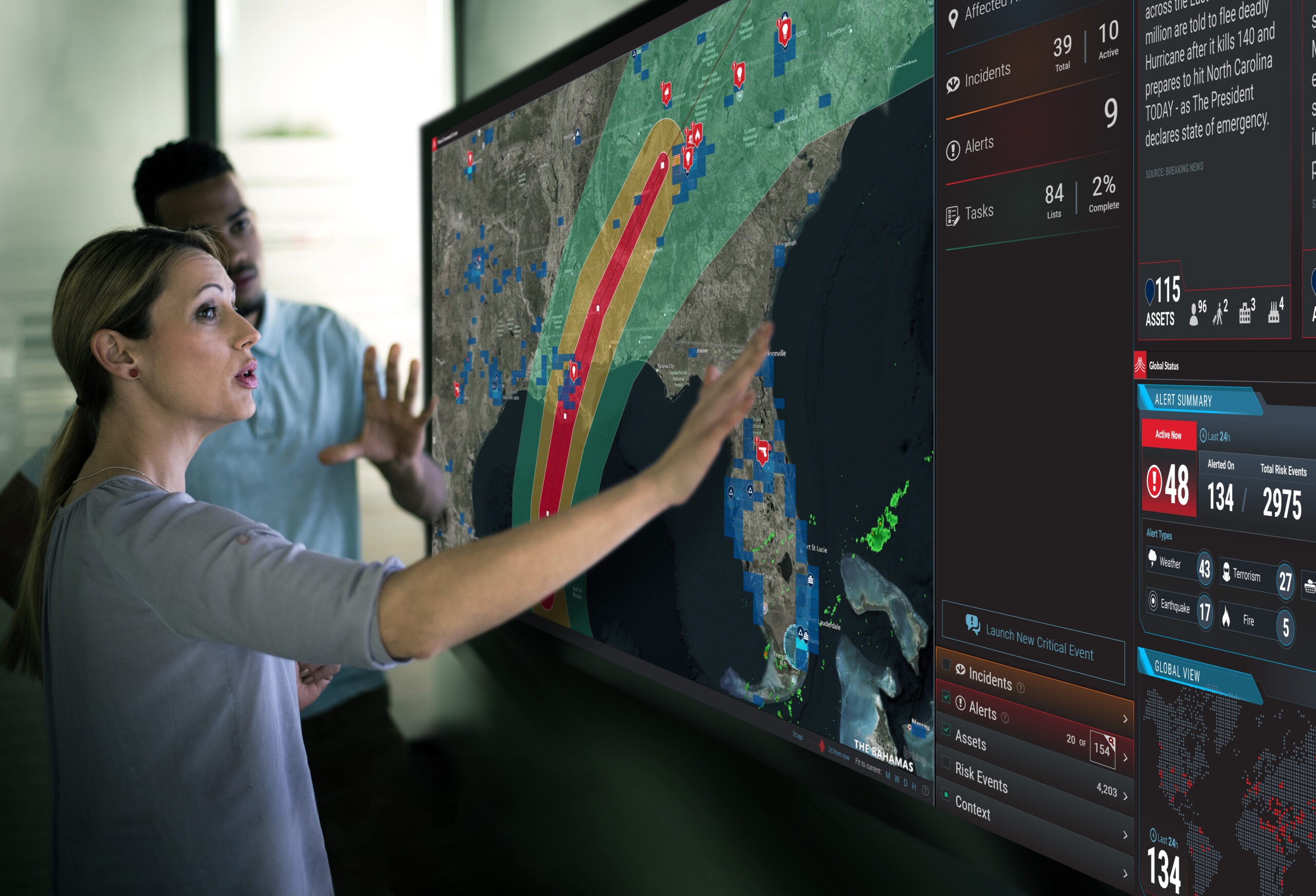Woman managing a hurricane with critical event management technology